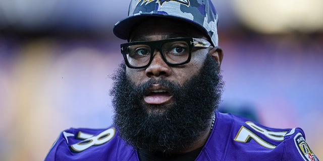 Morgan Moses, #78 of the Baltimore Ravens, warms up before the game against the Tennessee Titans at M&T Bank Stadium on Aug. 11, 2022 in Baltimore.