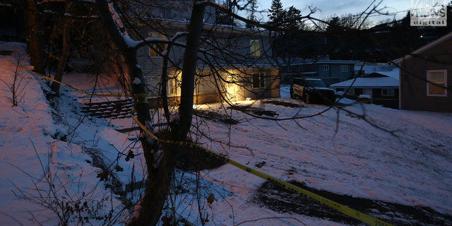 After cars were towed away for evidence, five empty parking spots are left outside the Moscow, Idaho, home where four students were stabbed to death.