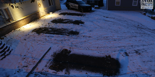 Four empty parking spots are seen outside the Moscow, Idaho home where four college students were murdered. The cars were towed away to use for "further evidence."