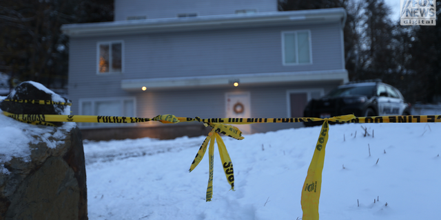 Crime scene tape is seen outside of the Moscow, Idaho home where four college students were stabbed to death on Nov. 13.