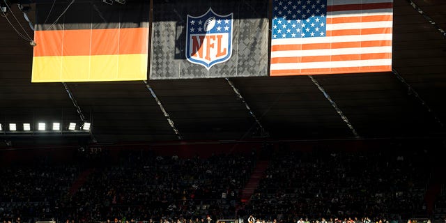 German and U.S. flags are displayed over Allianz Arena before the Tampa Bay Buccaneers took on the Seattle Seahawks in Munich, Germany, Nov. 13, 2022.