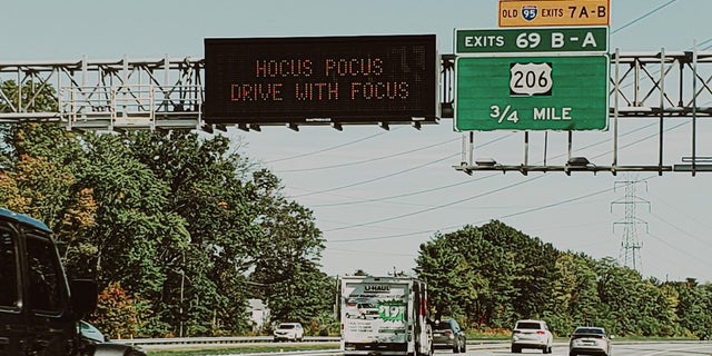 A sign reading "Hocus pocus drive with focus" on a New Jersey roadway. The state has been reportedly forced to take similar messages down on order of federal highway officials.