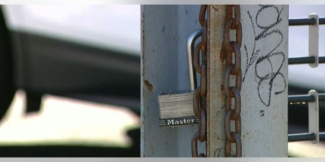 Broken lock at Carsiri car dealership in Queens, New York