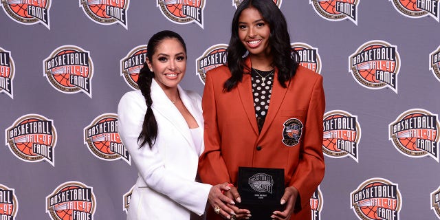 On behalf of Enshrinee Kobe Bryant, Vaness Bryant and Natalia Bryant poses for a portrait during the Class of 2020 Tip-Off Celebration and Awards Gala as part of the 2020 Basketball Hall of Fame Enshrinement Ceremony on May 14, 2021, at the Mohegan Sun Arena at Mohegan Sun in Uncasville, Connecticut.