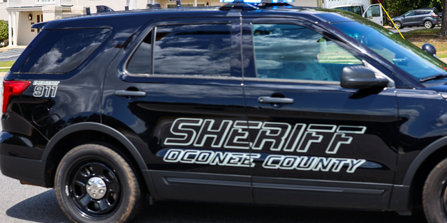 A staff member at a Georgia elementary school was arrested and fired after he left his bag containing a firearm in the school bathroom.
