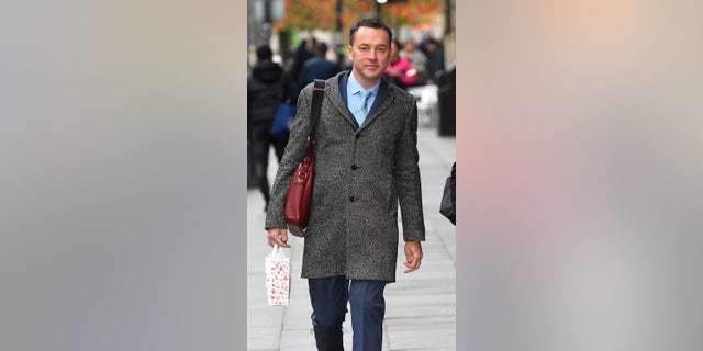 Plastic surgeon Dr. Olivier Branford arriving at a tribunal in Manchester, London. Branford is accused of taking advantage of vulnerable patients.
