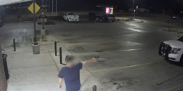 A man shot at Phoenix police officers in a patrol vehicle last month, authorities said.