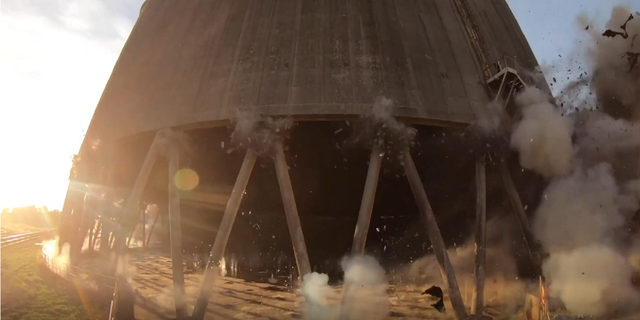 Video shows defunct Kentucky coal plant towers being imploded in