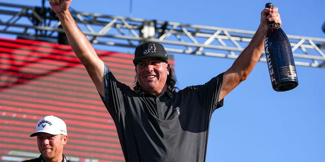 Pat Perez celebrates after winning the stroke play round of the LIV Golf Invitational - Miami Tag Team Championship on October 30, 2022, in Florida.