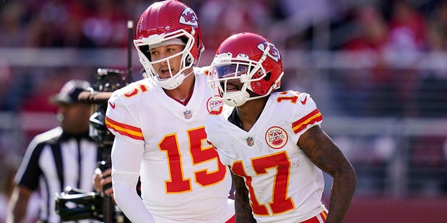 Kansas City Chiefs quarterback Patrick Mahomes and wide receiver Mecole Hardman celebrate a touchdown against the San Francisco 49ers in Santa Clara, California, Sunday, Oct. 23, 2022.