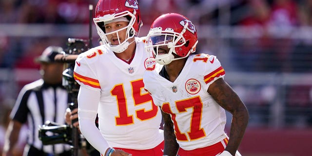 Kansas City Chiefs quarterback Patrick Mahomes and wide receiver Mecole Hardman celebrate a touchdown against the San Francisco 49ers in Santa Clara, California, Sunday, Oct. 23, 2022.