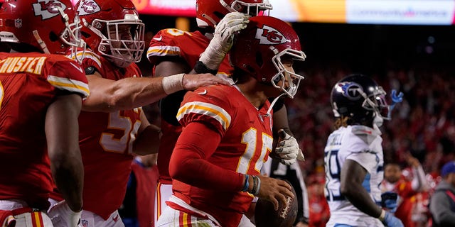 Kansas City Chiefs quarterback Patrick Mahomes celebrates after scoring during the second half of an NFL football game against the Tennessee Titans Sunday, Nov. 6, 2022, in Kansas City, Mo. (AP Photo/Ed Zurga)