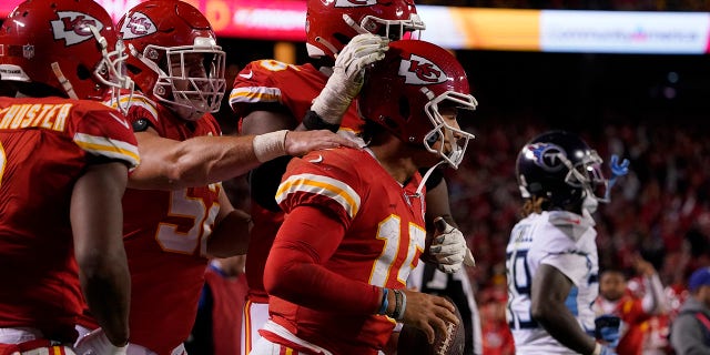 Kansas City Chiefs quarterback Patrick Mahomes celebrates after scoring during the second half of an NFL football game against the Tennessee Titans Sunday, Nov. 6, 2022, in Kansas City, Mo. (AP Photo/Ed Zurga)