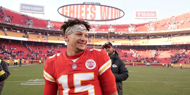 Kansas City Chiefs quarterback Patrick Mahomes smiles as he stands on the field following an NFL football game against the Jacksonville Jaguars Sunday, Nov. 13, 2022, in Kansas City, Missouri.