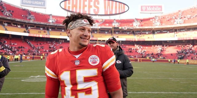 Kansas City Chiefs quarterback Patrick Mahomes smiles as he stands on the field following an NFL football game against the Jacksonville Jaguars Sunday, Nov. 13, 2022, in Kansas City, Missouri.