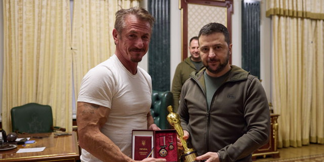 Actor and director Sean Penn on Tuesday gave Ukrainian President Vladimir Zelenskyy one of his Oscars as a symbol of strength and asked the leader to keep it until his country can defeat Russia.