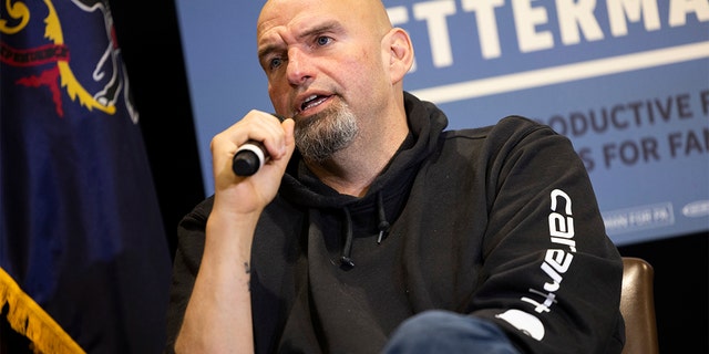 Sen. John Fetterman and Pennsylvania Congresswoman Mary Gay Scanlon, discuss reproductive freedom and the economy in Upper Darby, Pa., Nov. 4, 2022.