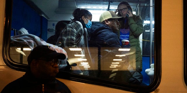 Migrants sent by Texas Gov. Greg Abbott arrive near the 30th Street station Wednesday morning in Philadelphia. Abbott has sent the buses to Democratic-led cities as a way to maximize exposure about what he says is the Biden administration's inaction on the large number of migrants crossing the southern border.