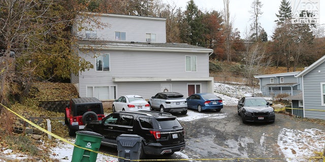 Law enforcement vehicles on the scene of the Idaho quadruple murder.