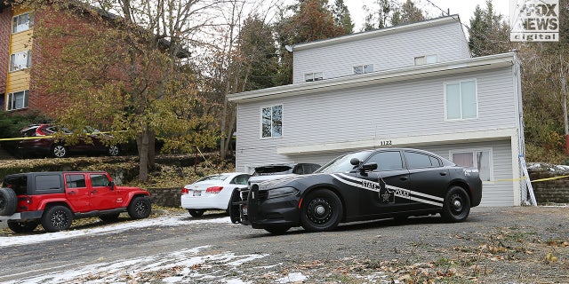 Law enforcement vehicles on the scene of the Idaho quadruple murder.