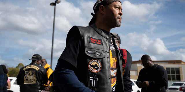This photo shows Rev. Alyn Waller following a "Black Bikers Vote" procession on Nov. 5, 2022, in Philadelphia. Walker belongs to the Enon Tabernacle Baptist Church.