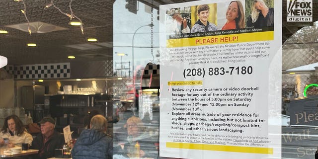 A sign posted in a local diner in Moscow, Idaho on Monday, Nov. 28, 2022 asks the public to look for clues in the quadruple homicide of four students from the University of Idaho.