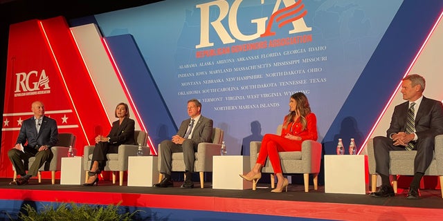 From left: Republican Govs. Pete Ricketts of Nebraska, Kim Reynolds of Iowa, Chris Sununu of New Hampshire, Kristi Noem of South Dakota and Bill Lee of Tennessee take part in a panel at the Republican Governors Association's annual winter meeting in Orlando, Fla., on Tuesday.