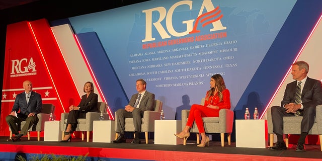 From left: Republican Govs. Pete Ricketts of Nebraska, Kim Reynolds of Iowa, Chris Sununu of New Hampshire, Kristi Noem of South Dakota and Bill Lee of Tennessee take part in a panel at the Republican Governors Association's annual winter meeting in Orlando, Fla., on Tuesday.