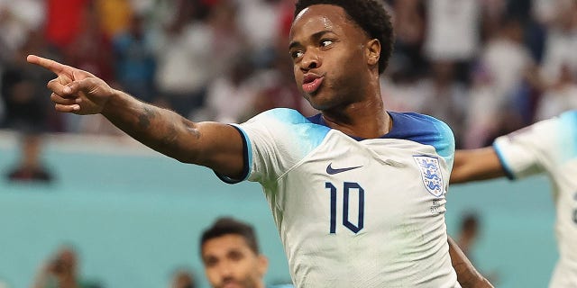 Raheem Sterling of England celebrates after scoring during a Group B match against Iran at the 2022 FIFA World Cup at Khalifa International Stadium in Doha, Qatar, Nov. 21, 2022.