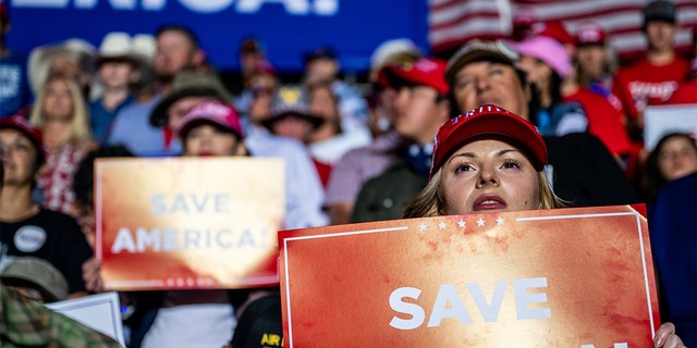 Supporters listen as former President Donald Trump speaks at the "Save America" rally on Oct. 22, 2022 in Robstown, Texas.