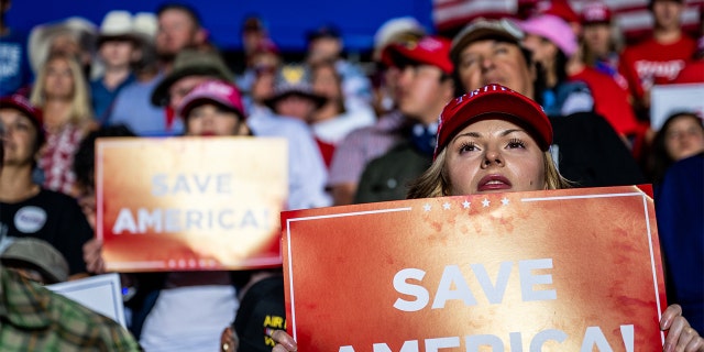 Supporters listen as former President Donald Trump speaks at the "Save America" rally on Oct. 22, 2022 in Robstown, Texas.