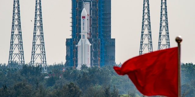 China's space station lab module Mengtian and a Long March 5B Y4 carrier rocket at the Wenchang Space Launch Site on Oct. 31, 2022, in Wenchang, China.