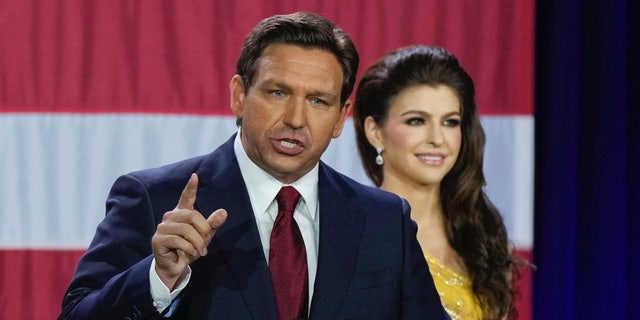 Gov. Ron DeSantis speaks to supporters, with his wife Casey at his side, after winning his race for re-election in Tampa, Florida, Nov. 8, 2022.