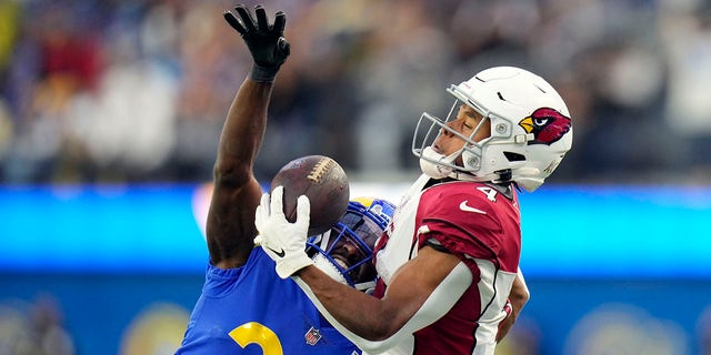Arizona Cardinals wide receiver Rondale Moore (4) makes a one-handed catch in front of Los Angeles Rams cornerback David Long Jr. (22) during the second half of an NFL football game Sunday, Nov. 13, 2022, in Inglewood, Calif. 