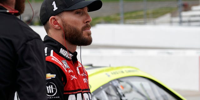 Ross Chastain watches cars during practice for the NASCAR auto race at Martinsville Speedway, Saturday, Oct. 29, 2022, in Martinsville, Virginia.