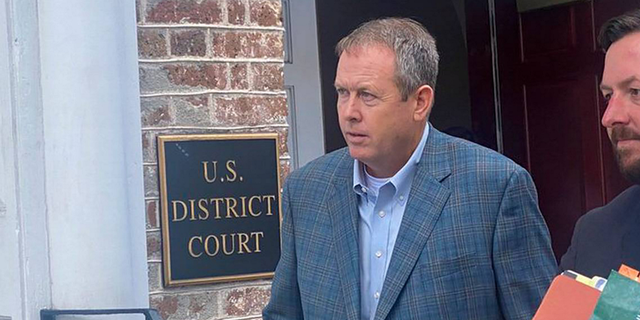 Former Palmetto State Bank CEO Russell Laffitte exits federal court in Charleston, South Carolina, on Sept. 6.