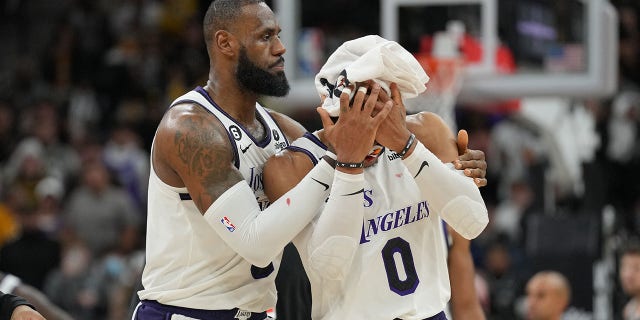 Lakers' Russell Westbrook bleeds after taking elbow to head against Spurs 3 LeBron James holds a towel to Russell Westbrook's head during the Spurs game at San Antonio on November 26, 2022.