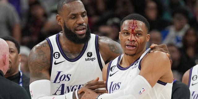 Los Angeles Lakers guard Russell Westbrook's forehead is bleeding profusely after being fouled by Spurs forward Zach Collins, Nov. 26, 2022, in San Antonio, Texas.