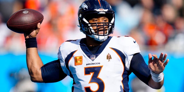 Denver Broncos quarterback Russell Wilson passes against the Panthers on Sunday, Nov. 27, 2022, in Charlotte, North Carolina.