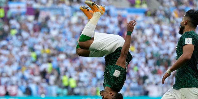 Salem Al-Dawsari of Saudi Arabia celebrates after scoring his team's second goal during their World Cup Group C match against Argentina at the Lusail Stadium in Lusail, Qatar, on Tuesday.