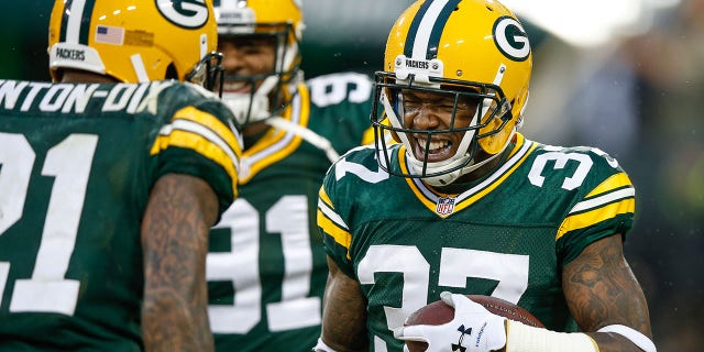 Sam Shields (37) of the Green Bay Packers celebrates after making an interception against the Dallas Cowboys in the first quarter at Lambeau Field Dec. 13, 2015, in Green Bay, Wis.