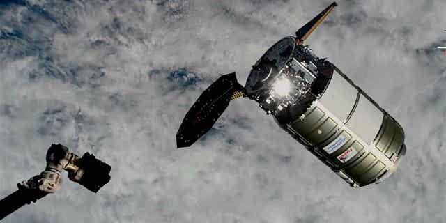 A Northrop Grumman cargo ship about to be captured by the International Space Station’s robot arm on Nov. 9, 2022. The capsule delivered more than 8,000 pounds of supplies to the ISS despite a jammed solar panel.