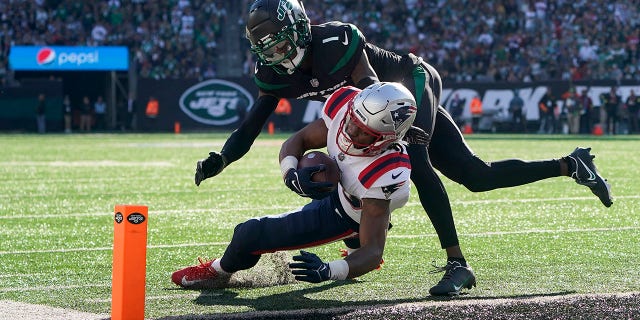 New England Patriots wide receiver Jakobi Meyers crosses the goal line to score against New York Jets, Sunday, Oct. 30, 2022.