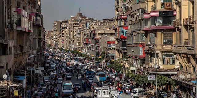 People crowd a street hours before a curfew in Cairo, Egypt, April 14, 2020. Saudi Arabia agreed on Nov. 29, 2022 to extend the terms of an aid package of 5 billion dollars in Egypt in March.