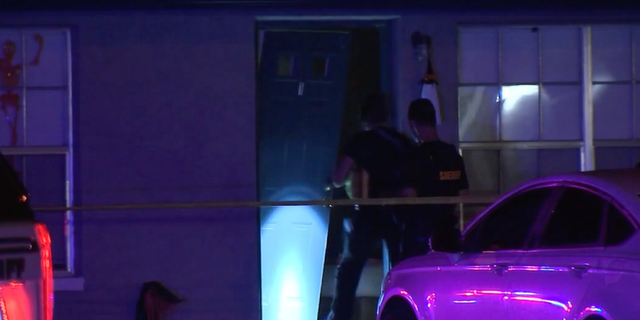 Florida woman shot and killed while lying in bed with her children in ...