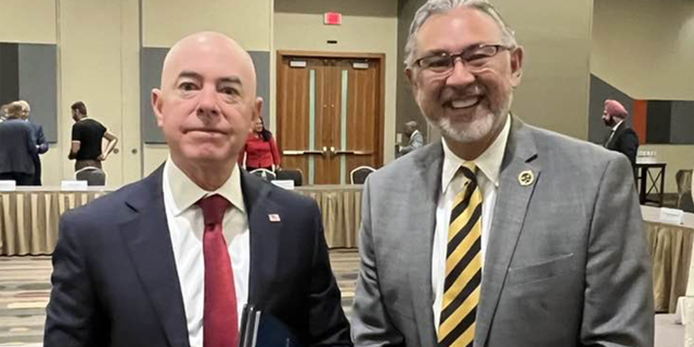 Gonzalez, pictured here with DHS Secretary Alejandro Mayorkas, first received backing from Soros in 2018.