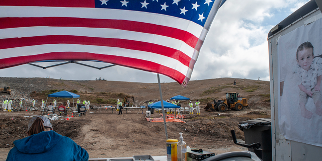 Investigators continued searching for Quinton Simon's remains Wednesday at the Chatham County Waste Management landfill, as a photo of the missing child watched over them.