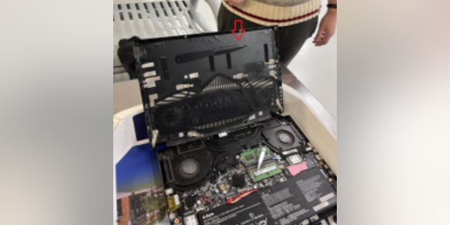 TSA agents disassembled the laptop and located the hidden knife.