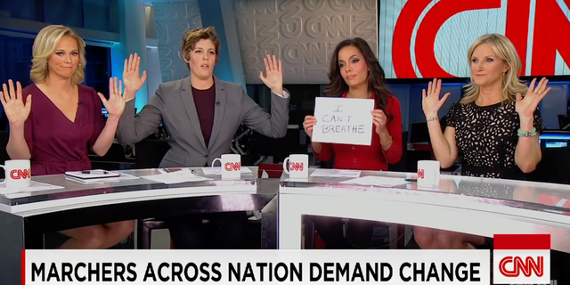 In 2014, CNN pundits mimicked the "Hands up, don't shoot" pose in solidarity with protesters. The Department of Justice under the Obama administration later revealed it was false that Michael Brown had his hands raised before being killed by a policeman.