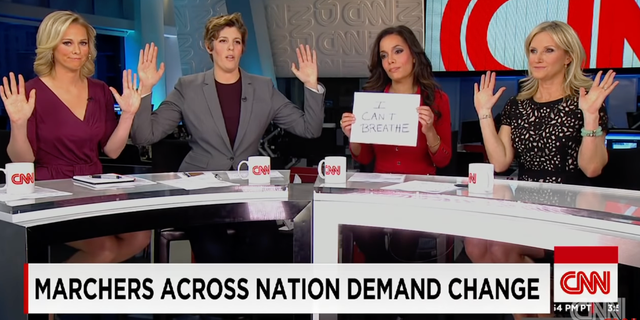 In 2014, CNN pundits mimicked the "Hands up, don't shoot" pose in solidarity with protesters. The Department of Justice under the Obama administration later revealed it was false that Michael Brown had his hands raised before being killed by a policeman.